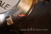 Image #17: Omega 2907.50.91 "Casino Royale" caseback, featuring red tamper evidency dot